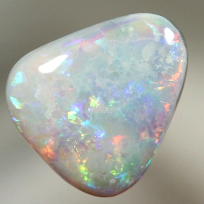 SOLID SEMI BLACK OPAL Very brightly in rolling flashes 